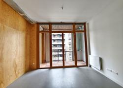Surélévation en structure bois et transformation de bureaux en logements à Paris